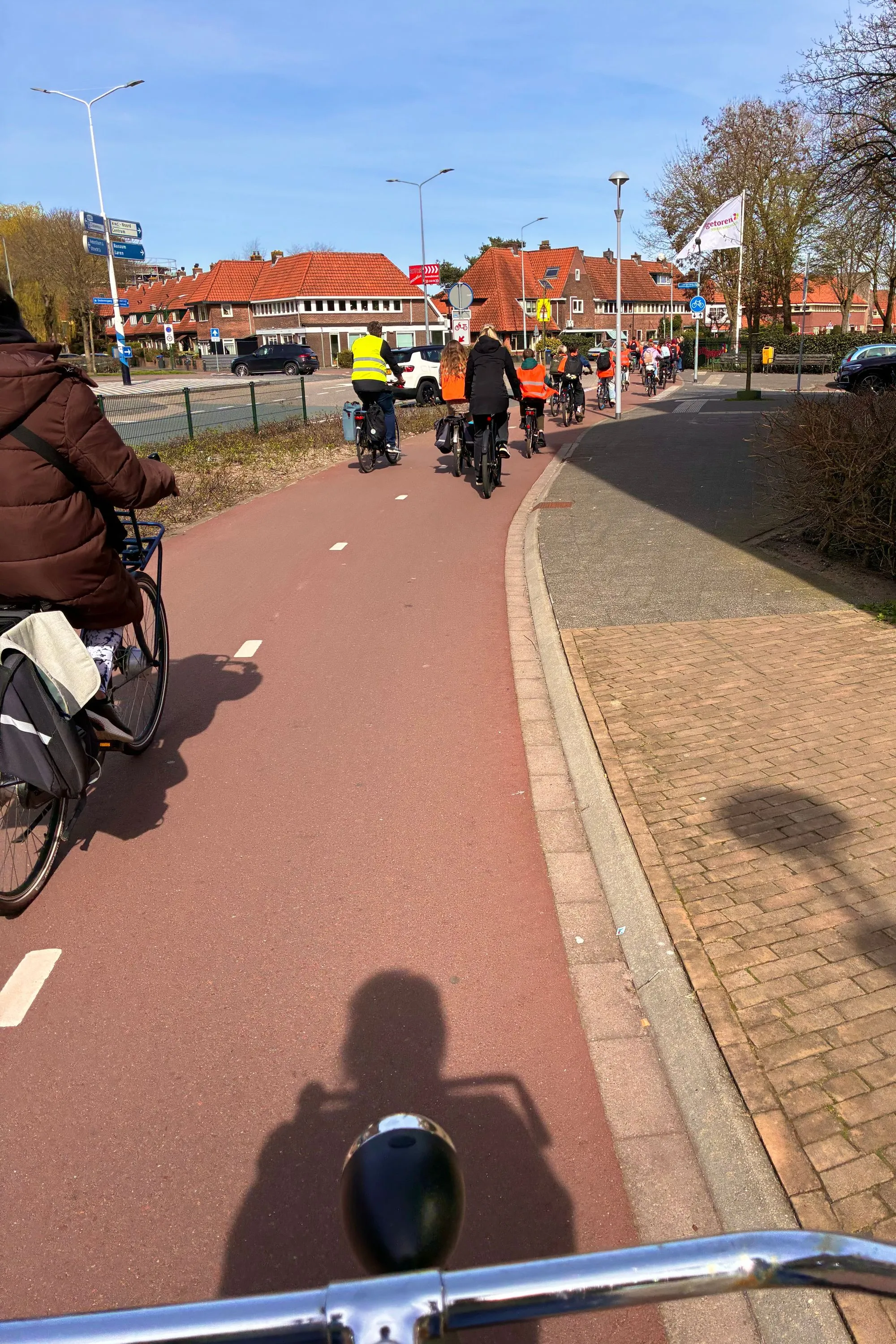 2026-03-20 - Bike path with kids with orange jackets on