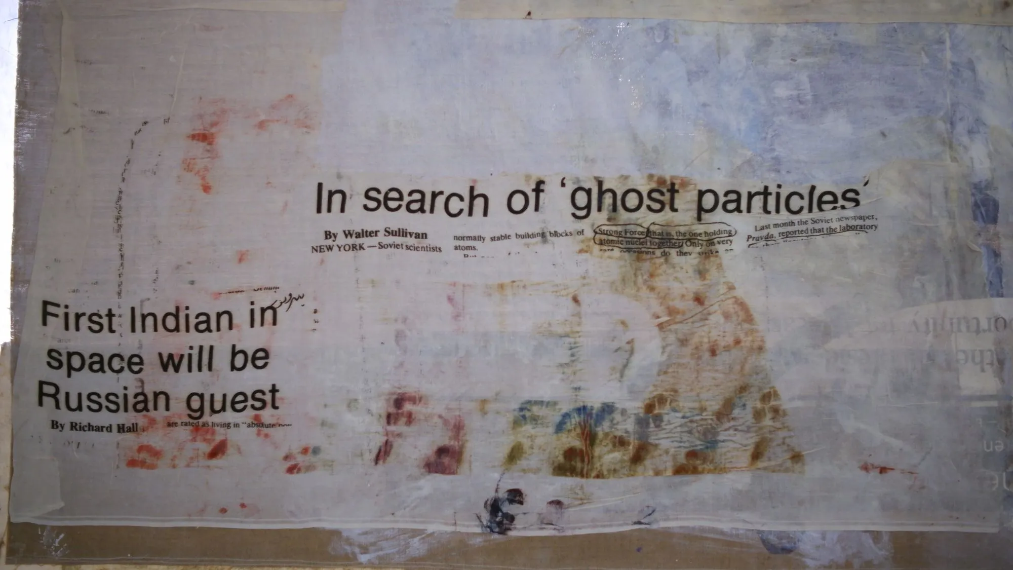 Art on wall with the words "In search of ghost particles" and "First Indian in space will be Russian guest"
