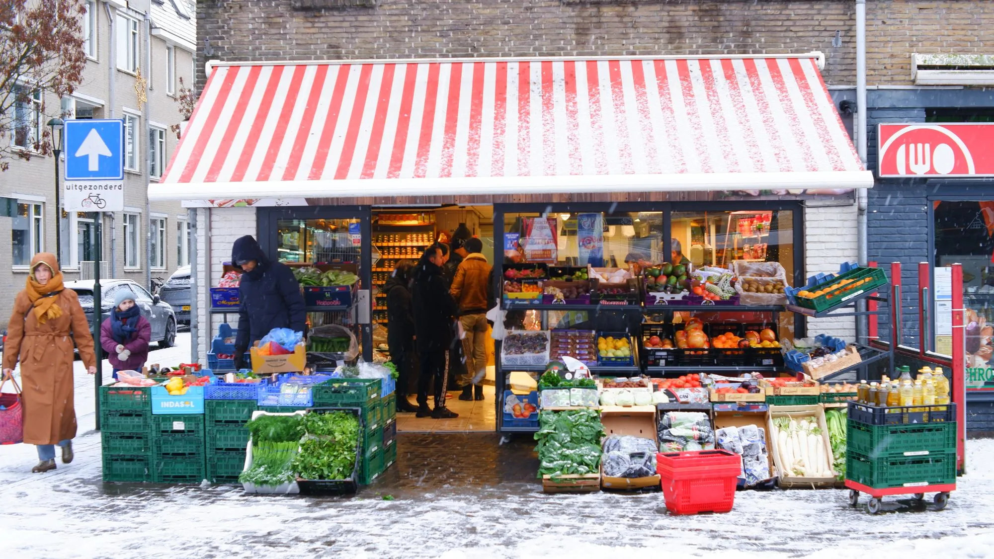 Grocery store covered in snow