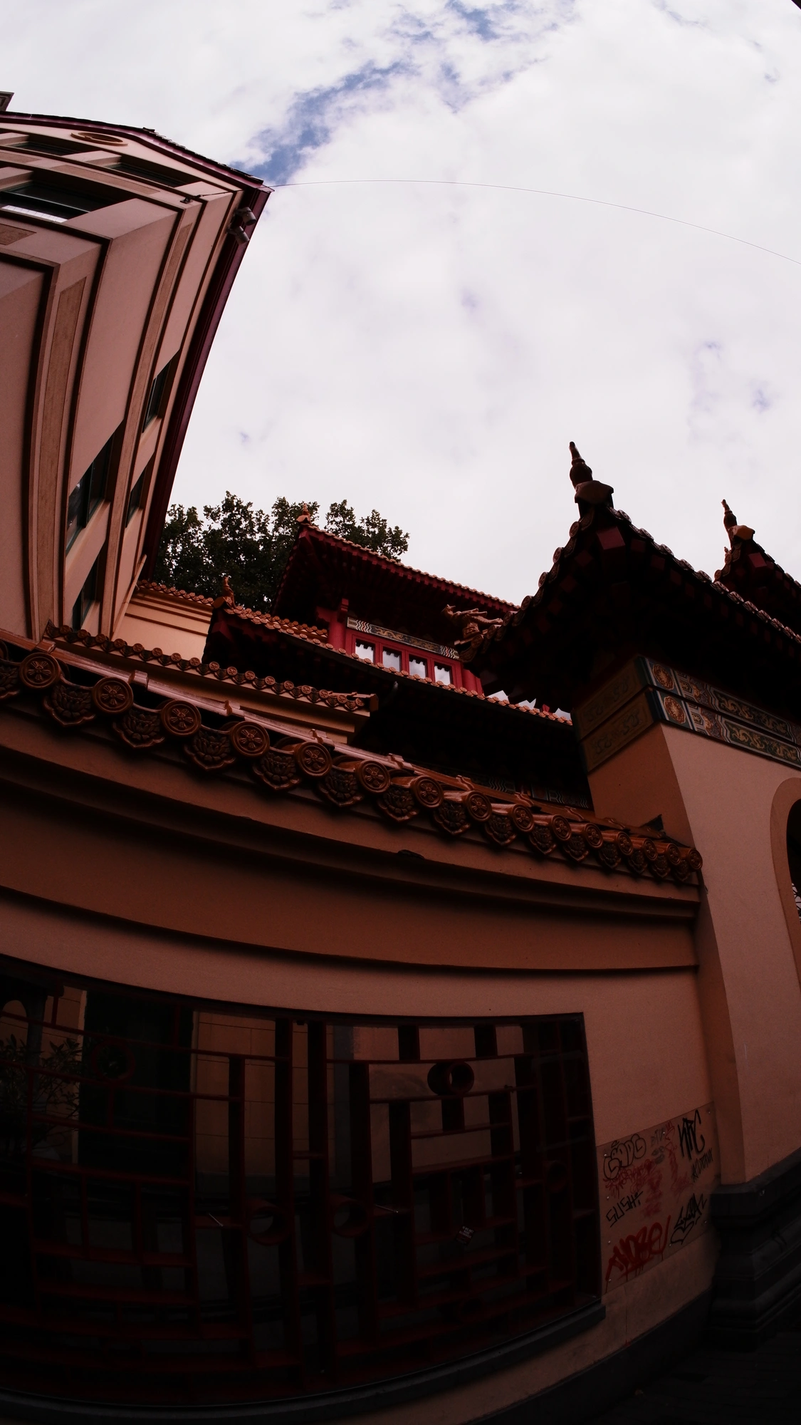 Closeup of peach Chinese-style building