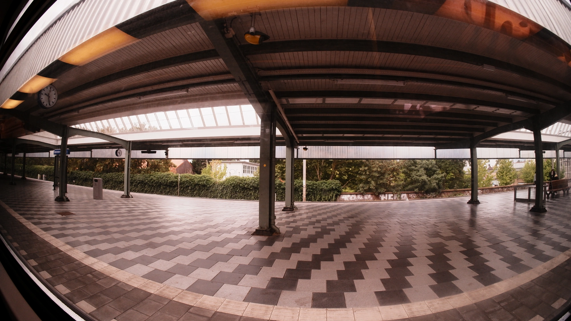 Empty train platform with checkered tiles
