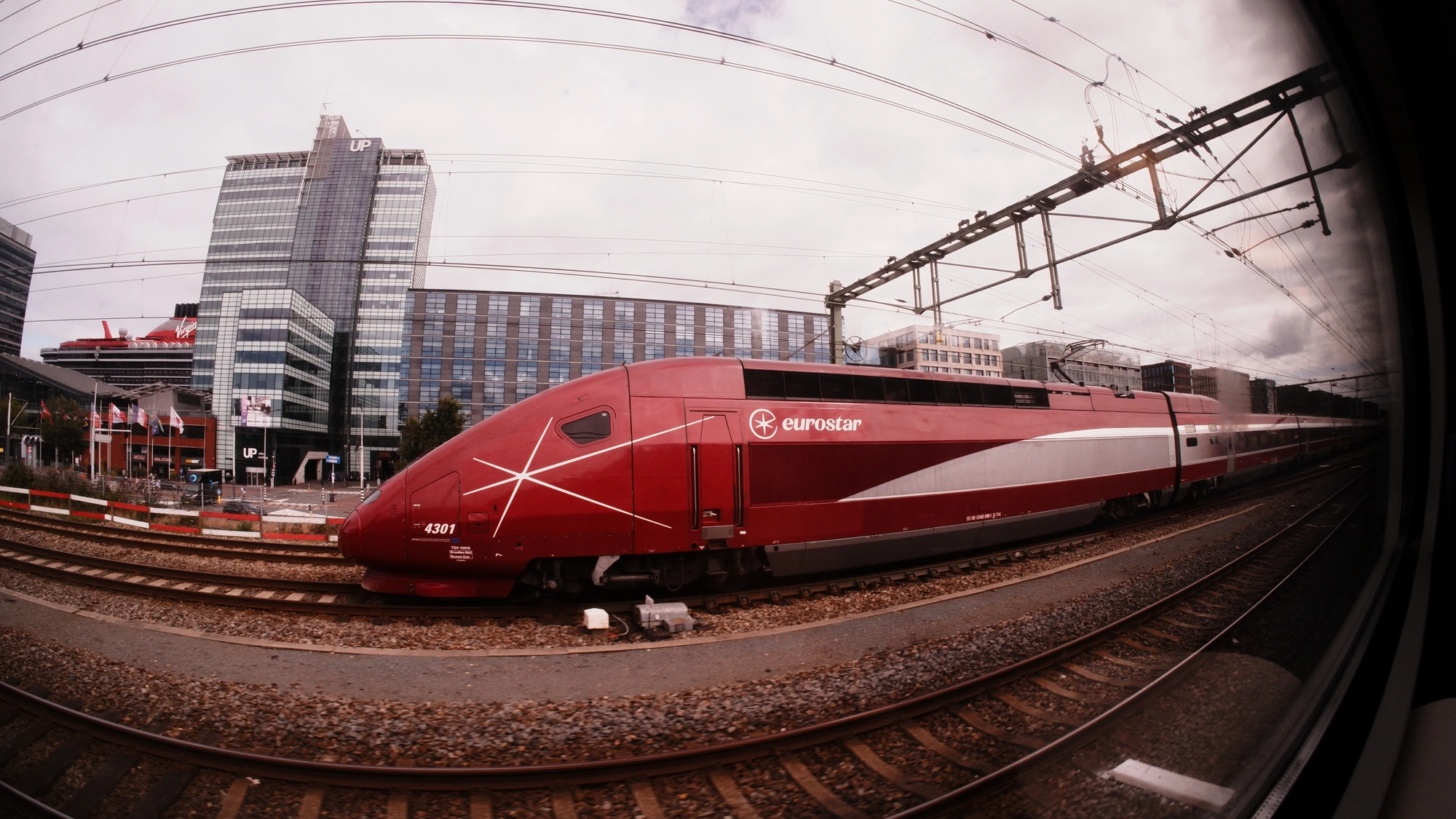 Maroon Eurostar train through train window