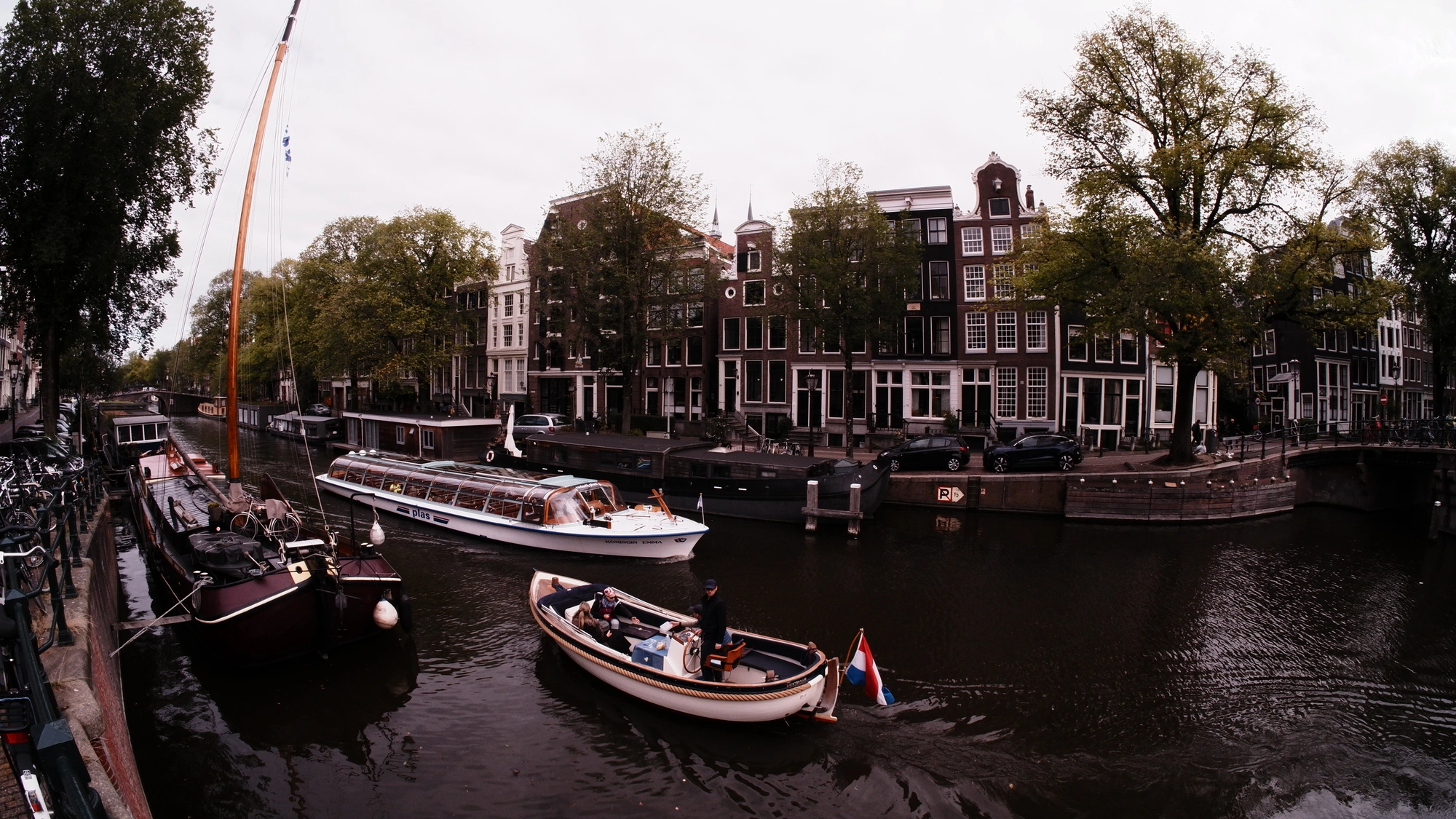 Tuor boat passing small boat