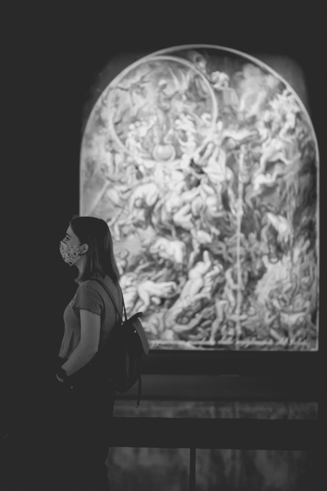 2022-02-16 - xt35 - bw - ZA - Cape Town - Woman stands in front of painting