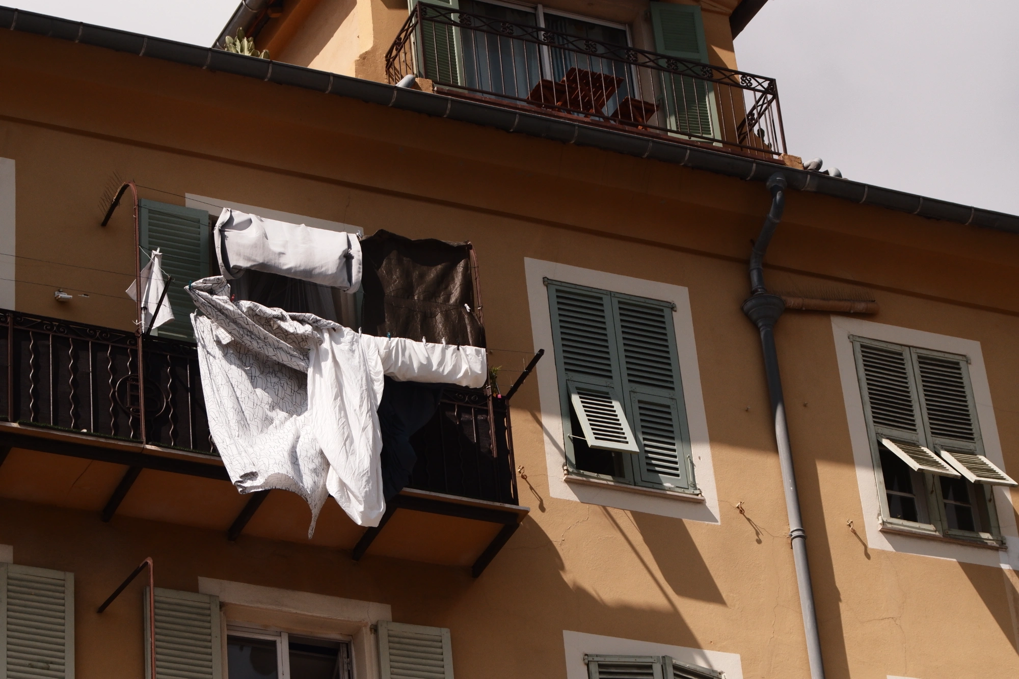 Bedsheets on balcony
