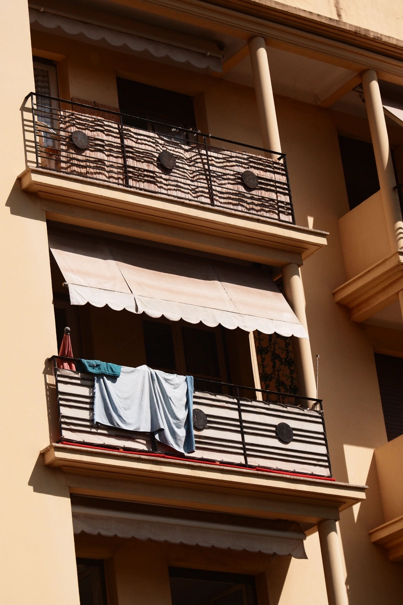 Towels hanging over balcony