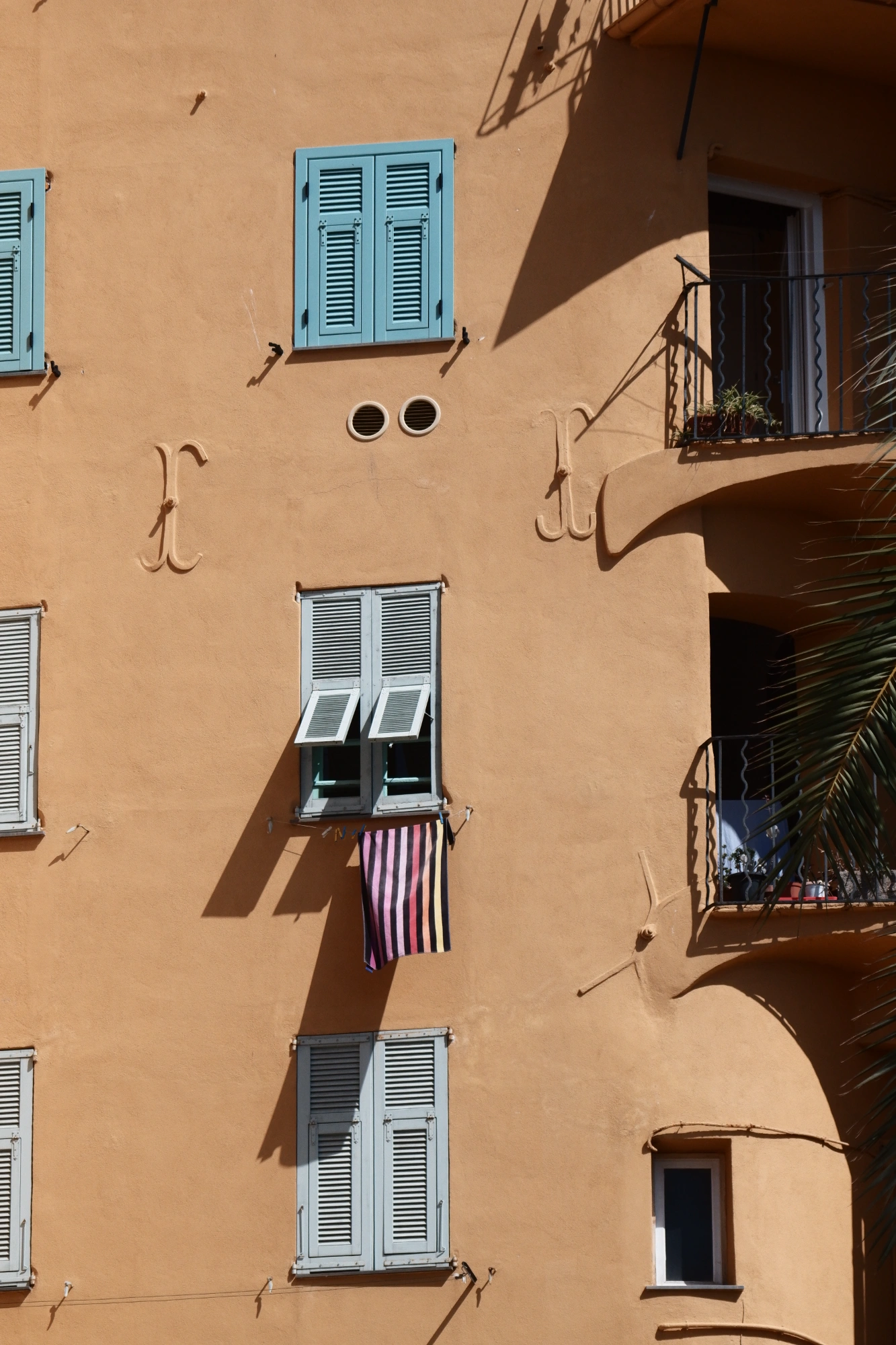 Towel hanging outside of window
