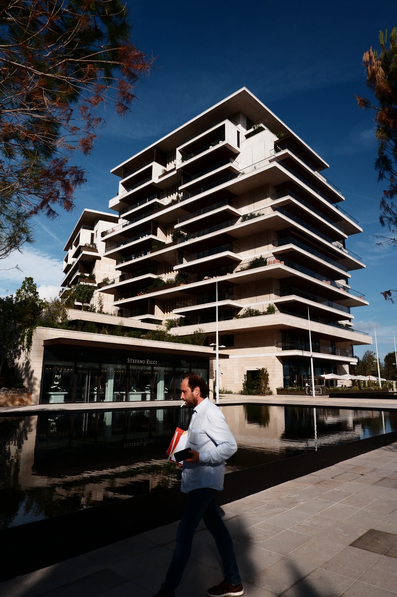 Person walking in front of building