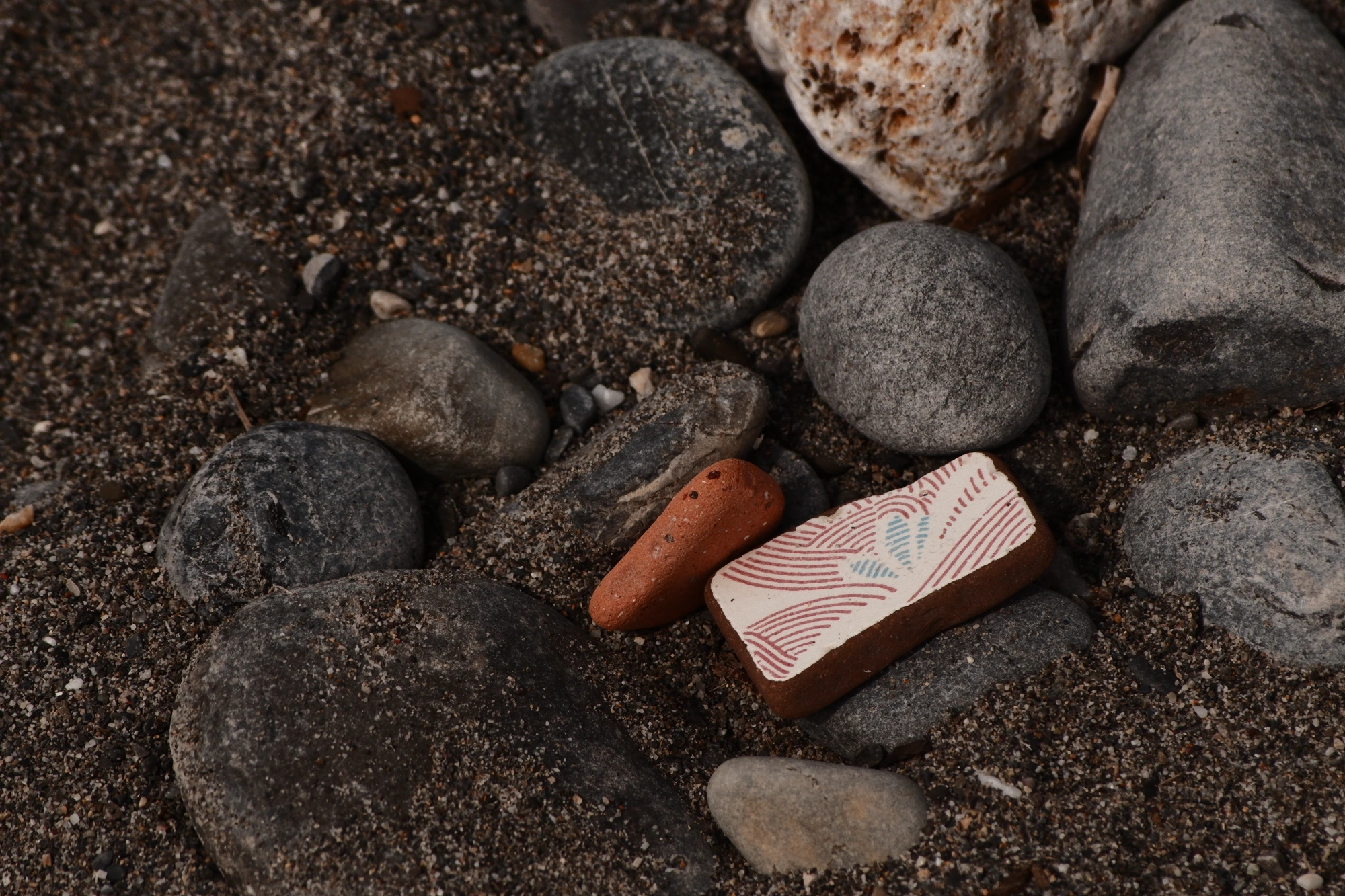Painted stone on beach