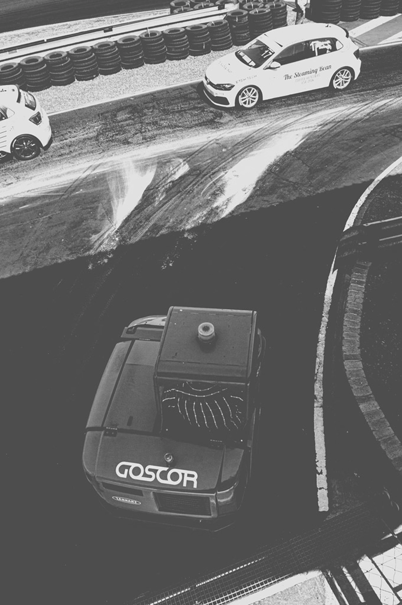 2019-07-27 - n18-55 - bw - ZA - Zwartkops Raceway - Track clearing machine beside the track