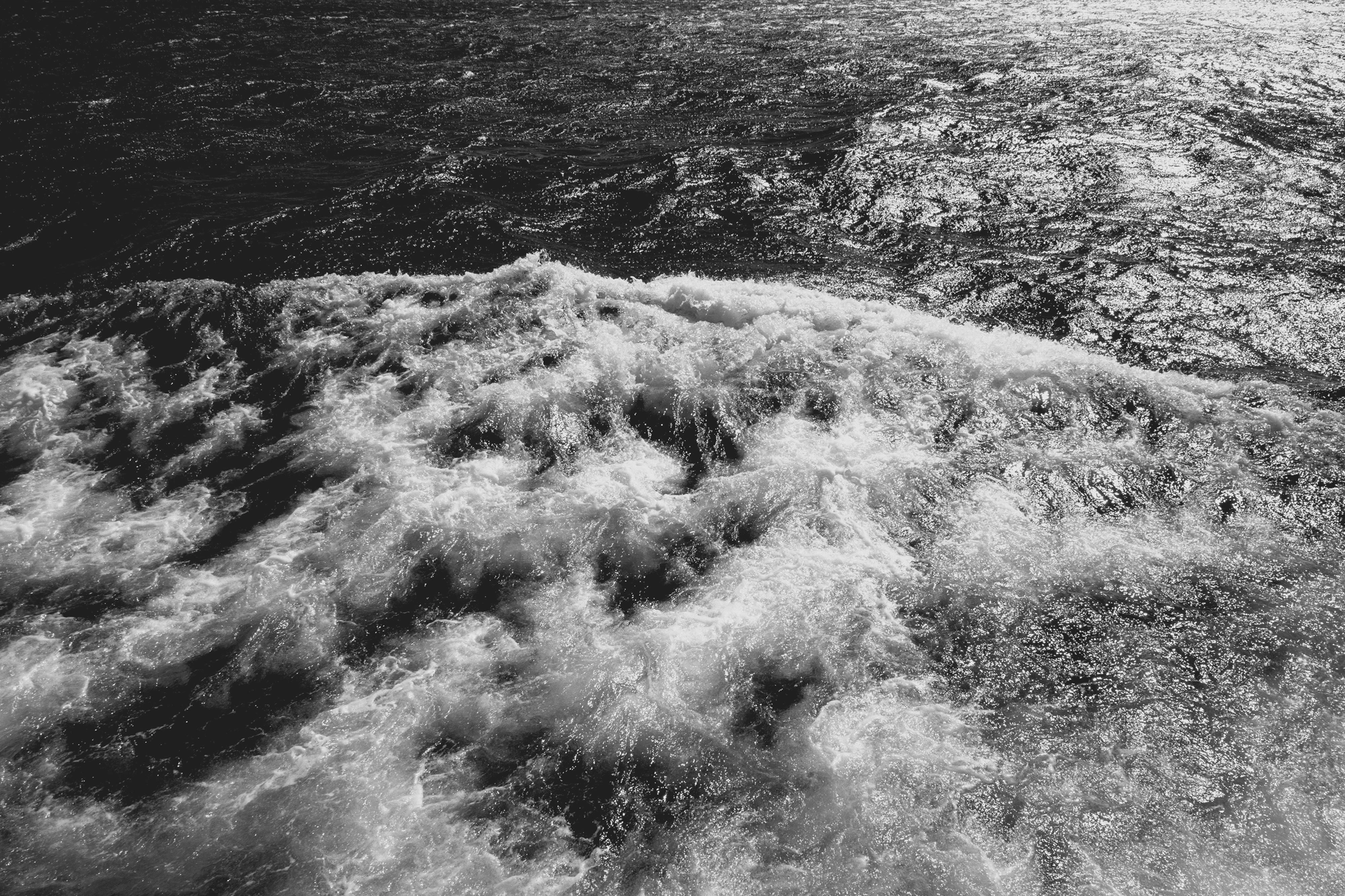 2022-02-13 - Cape Town -Small waves moving along the surface of the ocean.j