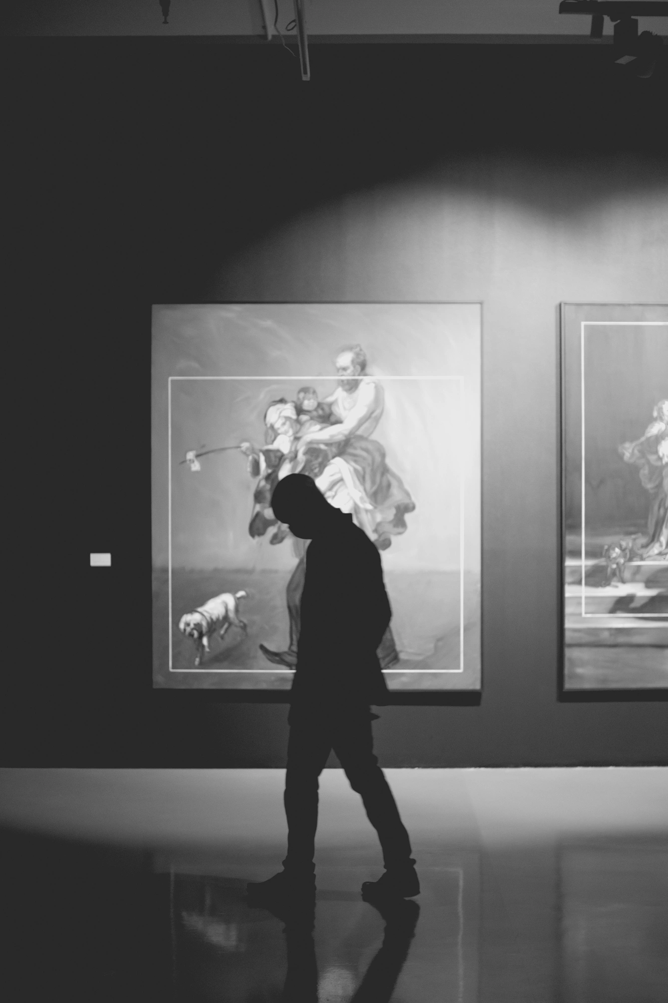 2022-02-16 - Cape Town - Man walks in front of painting.j