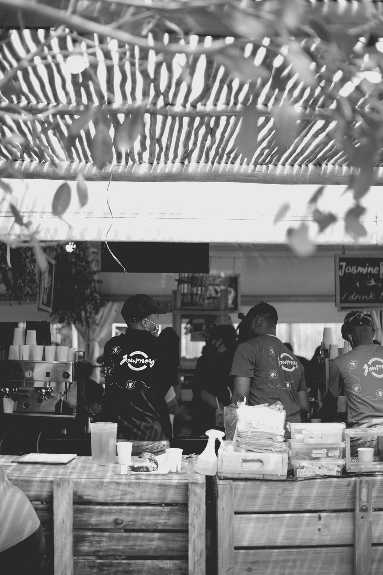 2022-02-18 - Cape Town - Baristas standing at coffee shop.j