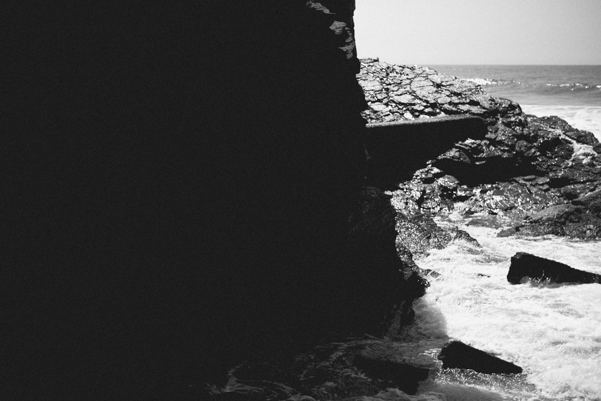 2022-09-22 - Durban -  Water splashing against rocks.j