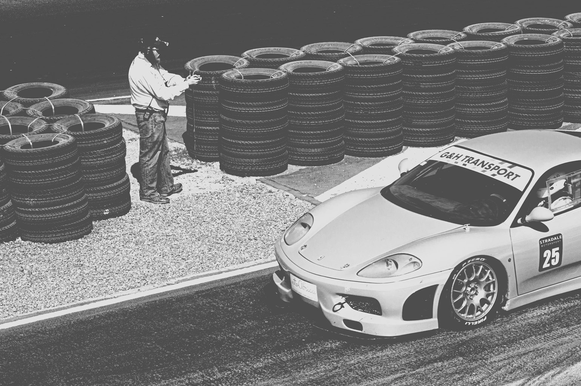 2019-07-27 - Zwartkops Raceway - Man with clipboard beside race car.j