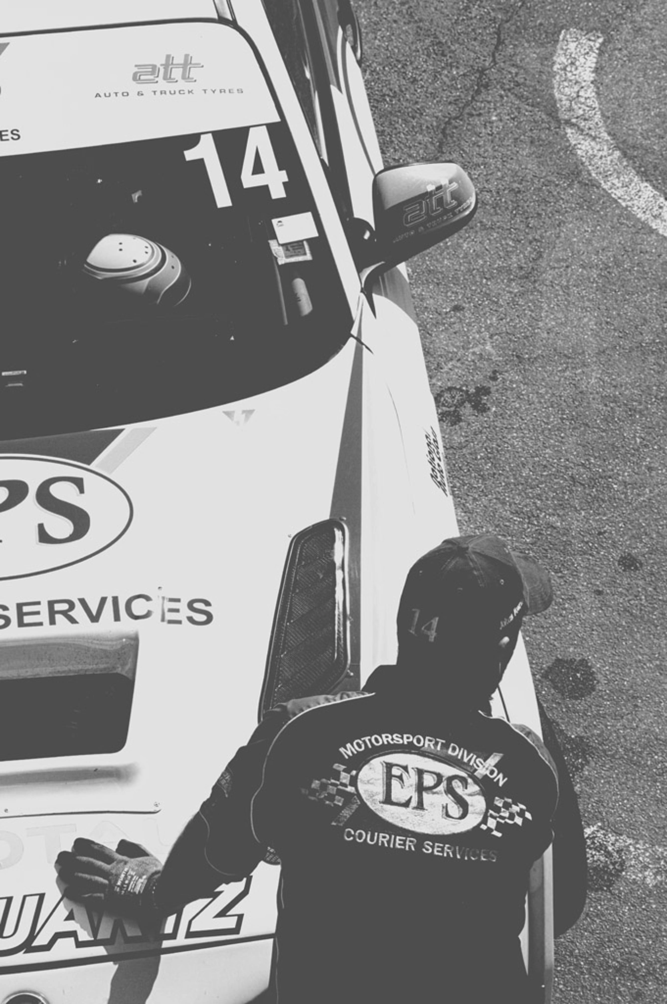 2019-07-27 - Zwartkops Raceway - Person standing with hand on racecar bonnet.j
