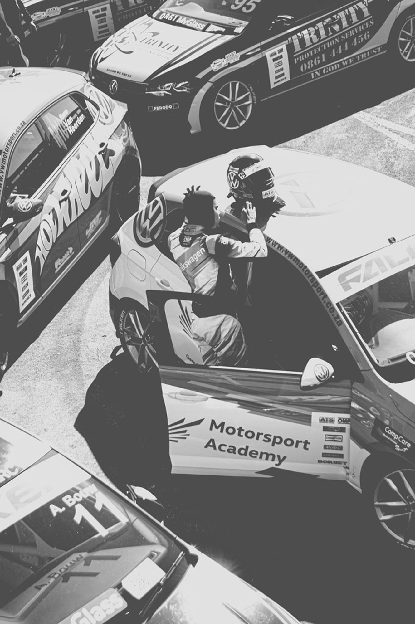 2019-07-27 - Zwartkops Raceway - Racecar driver with helmet on car.j